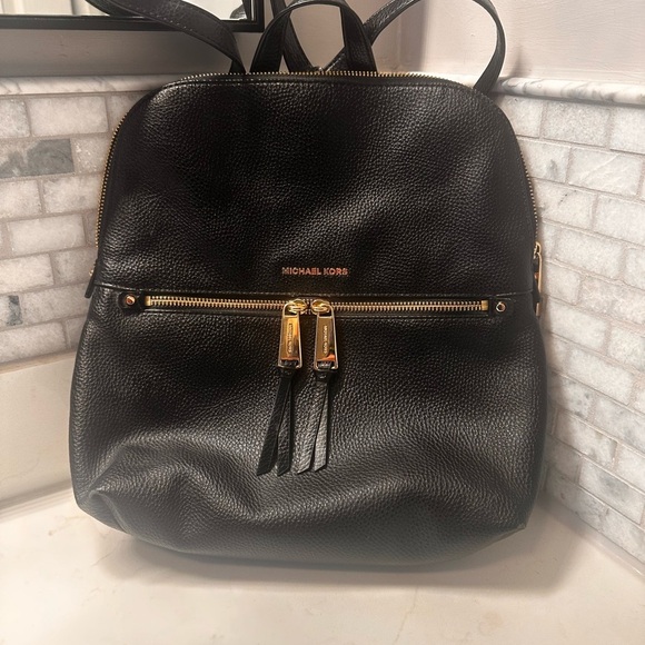Michael Kors Handbags - Michael Kors Black Textured Backpack with Gold Accents